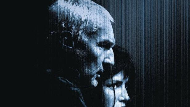 Das Filmplakat für „Chien 51“ zeigt die Gesichter eines Mannes und einer Frau im Dunkeln.