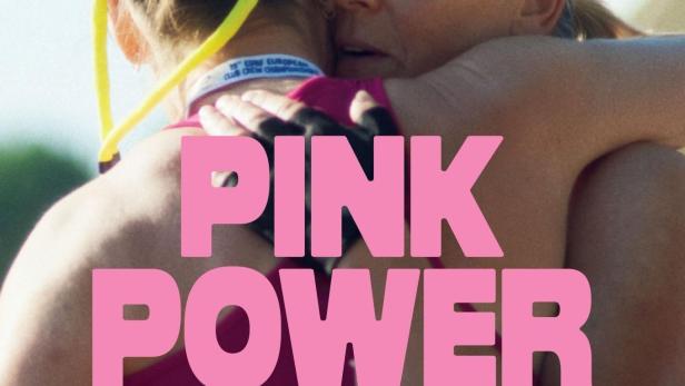 Das Filmplakat für „Pink Power“ zeigt zwei Frauen, die sich umarmen.