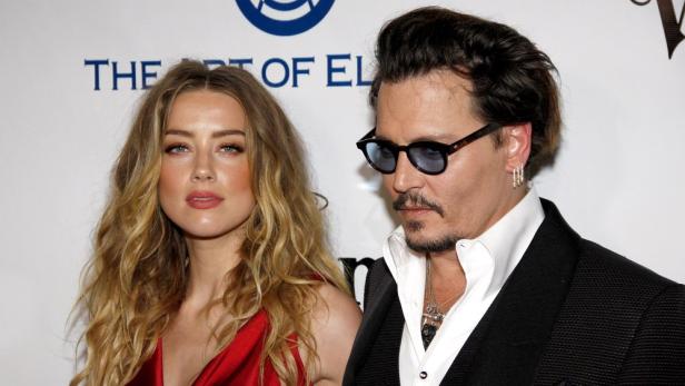 Amber Heard und Johnny Depp bei Pressetermin