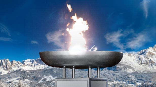 Olympisches Feuer vor Bergkulisse