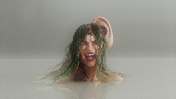 Bild einer schreienden Frau - hinter ihr ist in große Menschenohr zu sehen