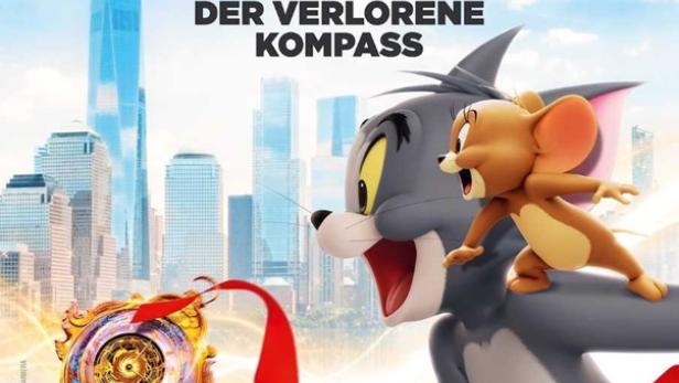 Tom und Jerry blicken begeistert auf einen Kompass vor chinesischer Landschaft