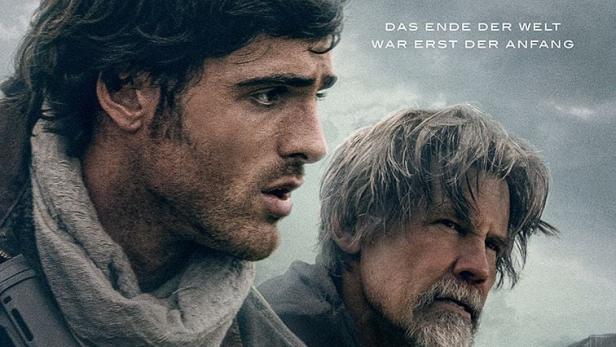 Zwei bewaffnete Männer und ein Hund vor einer zerstörten Stadtkulisse auf dem Filmplakat zu „Das Ende der Sterne“ von Regisseur Ridley Scott.