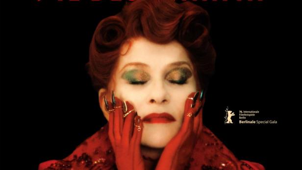 Filmplakat für „Die Blutgräfin“ von Ulrike Ottinger mit Isabelle Huppert in roter Kleidung und mit langen Fingernägeln vor schwarzem Hintergrund.