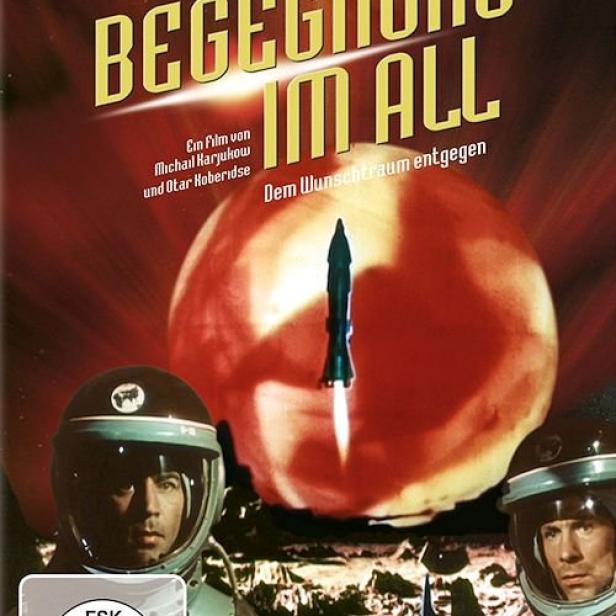 Das Filmplakat für „Begegnung im All“ zeigt zwei Astronauten und eine Rakete vor einem roten Planeten.