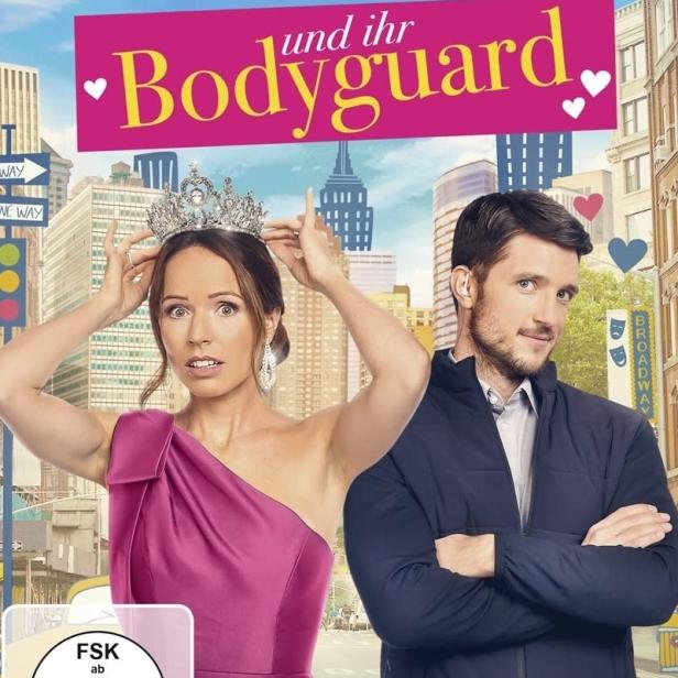 Das Filmplakat für „Die Prinzessin und ihr Bodyguard“ mit Emily Alatalo und Ryan Bruce vor einer New Yorker Straßenszene.